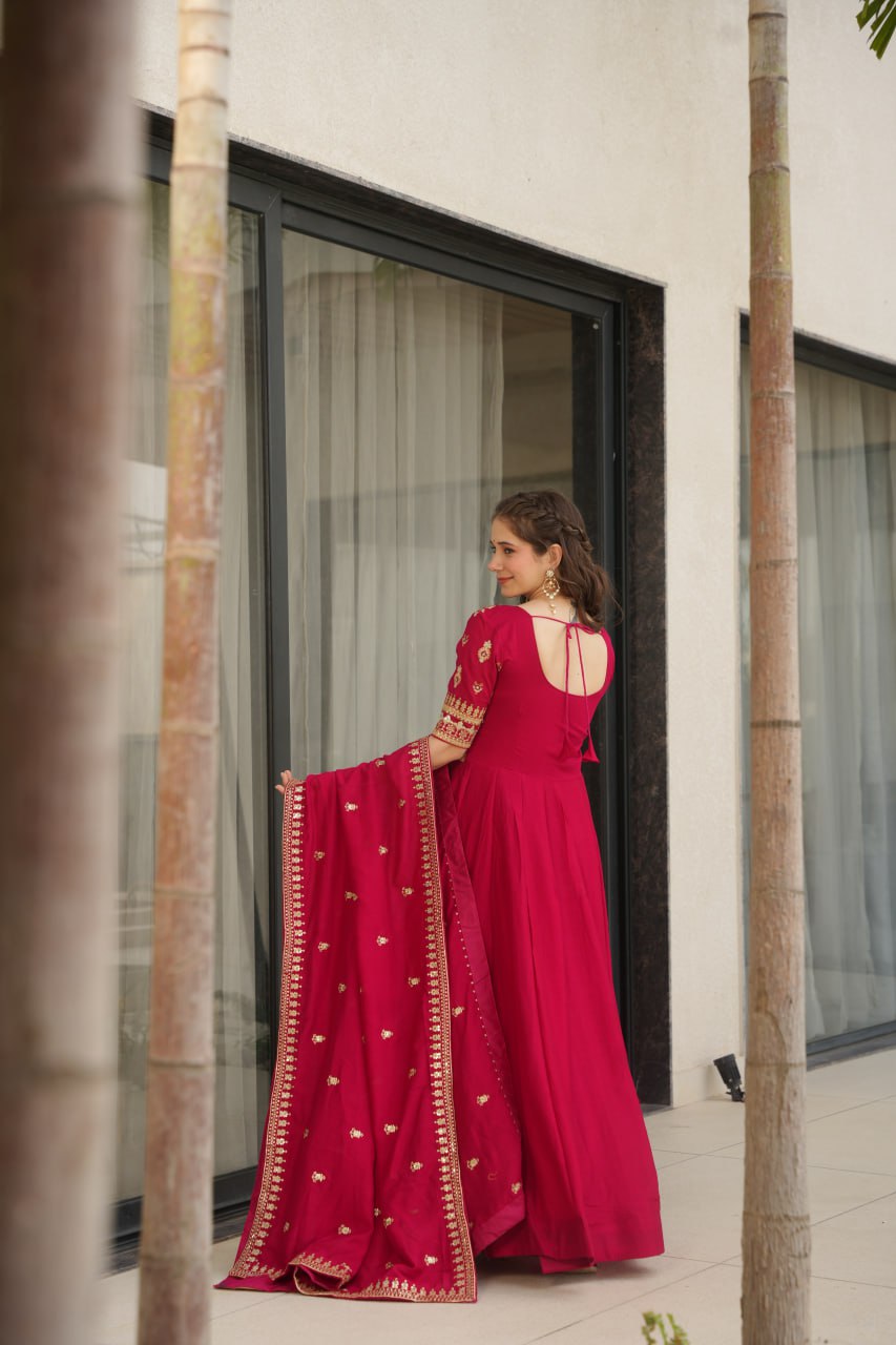 Aadishri Pink Vichitra Silk Gown with multi-sequins and zari embroidery – perfect Indian ethnic wear for weddings, party wear dresses for women, designer gown for women, traditional Indian dress, Indian clothing for women, ethnic wear for girls, gown for wedding function, Indian dress online shopping, full sleeve gown for women, festive wear for ladies.